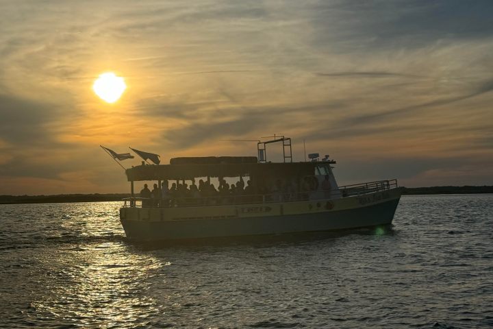 a small boat in a large body of water